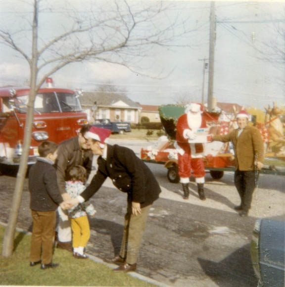 This photo also in front of the Vinci residence features the late Billy Neill and the late John Cacci (Santa's helpers) and dated December 1969.  